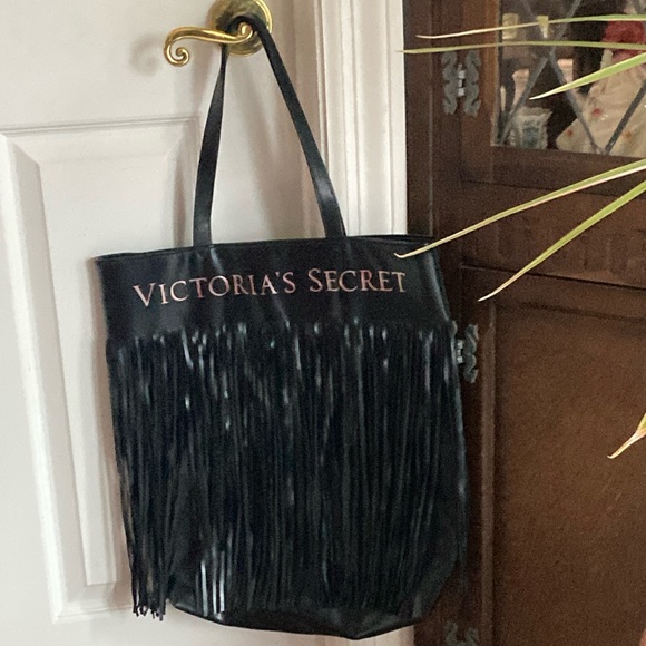 VICTORIA’S SECRET black tote bag with 16“ long fringe on vinyl.  $15 - Picture 3 of 6